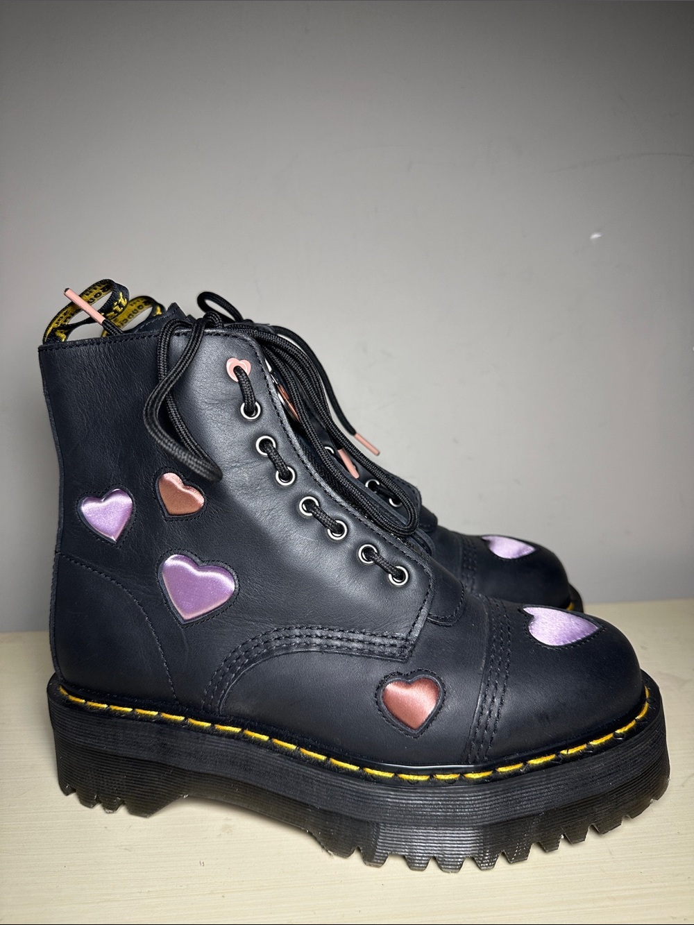 Dr. Martens black leather Sinclair pink and purple Heart platform boots